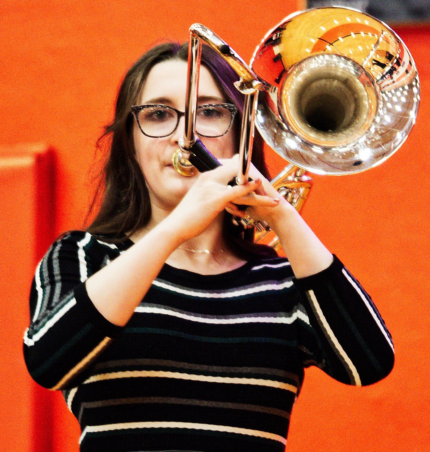 Gabby Wolf plays a trombone solo in the jazz band.